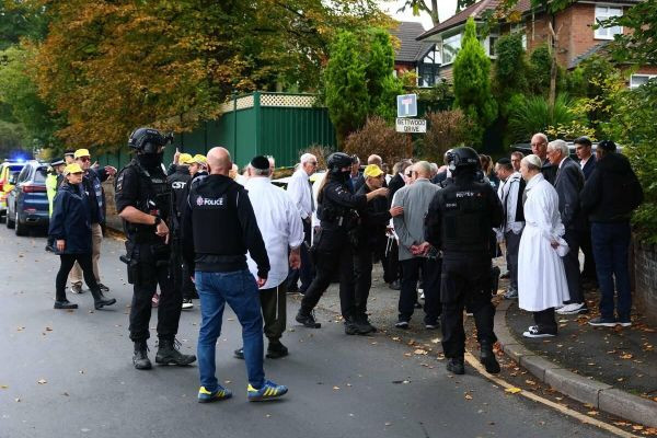 Two men charged over alleged Manchester terror plot